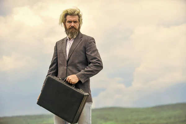 happy and successful man hold money case. bearded man show office briefcase. good business deal. successful business concept. rich man with beard. live in luxury. bag with money. lottery winnings