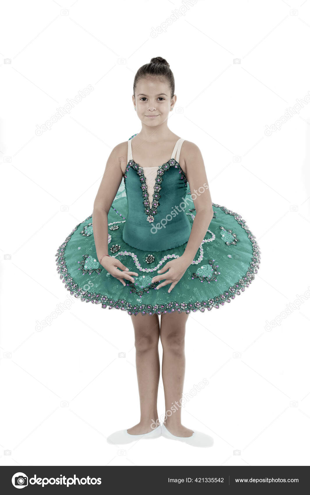 Niña En La Posición De Ballet Pequeña Bailarina En Tutú Azul