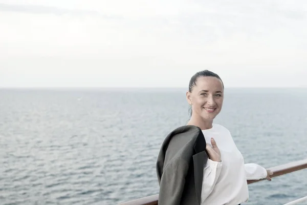 Pretty business woman or happy cute girl on ship deck — Stock Photo, Image