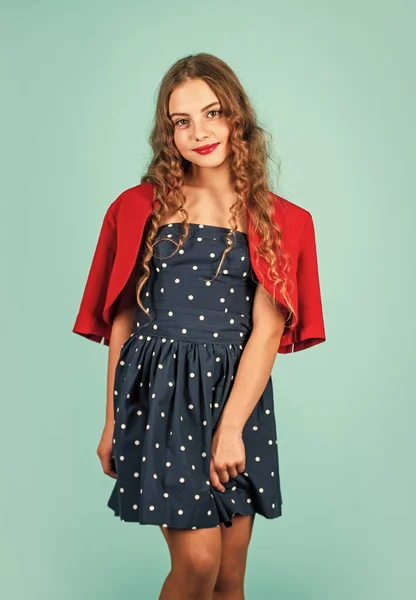 Retailers appear to share viewpoint of movement towards vintage fashion. Vintage inspirations used in current design. Retro kid. Rise of Vintage Fashion. Little girl makeup face vintage style outfit