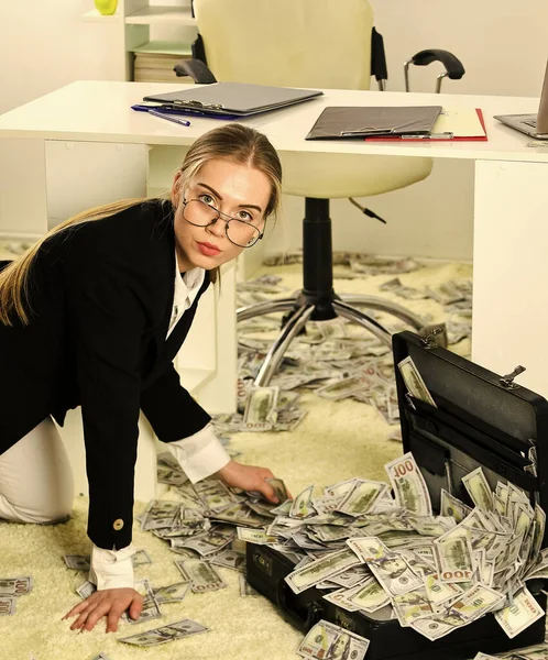 Woman counting money. Business investment. Office is littered with money. Business challenges. Owner of small business. Accounting and banking. Accountant office. Financial success. Tax service — Stock Photo, Image