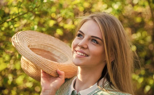 Romantic daydreamer hold summer hat. Rustic soul. Straw hat adorable girl. Rustic outfit. Ranch culture. Western traditions. Fancy smiling girl portrait. Fashion style concept. Rustic style — Stock Photo, Image