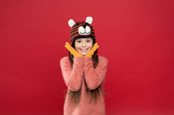 What a great surprise. feel comfortable and cozy in any weather. winter holiday and vacation. kid in hat with ear flaps. child in knitted sweater. happy childhood. happy teen girl wear warm clothes — Stock Photo, Image