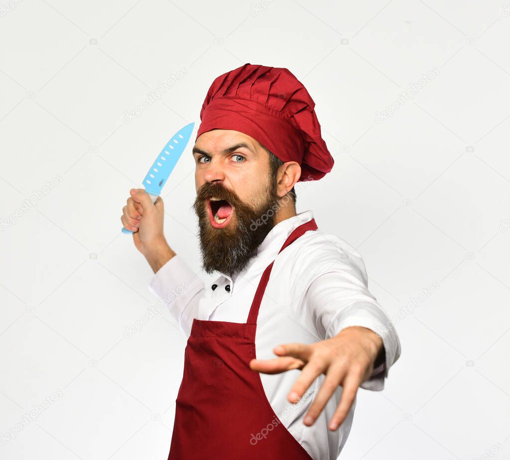 Cooking equipment and cuisine concept. Man with beard