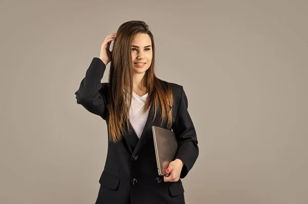 Another working day. confident office worker. fashion beauty look. formal fashion style. brunette woman with trendy makeup. sexy girl in jacket hold laptop. successful woman work online on computer — Stock Photo, Image