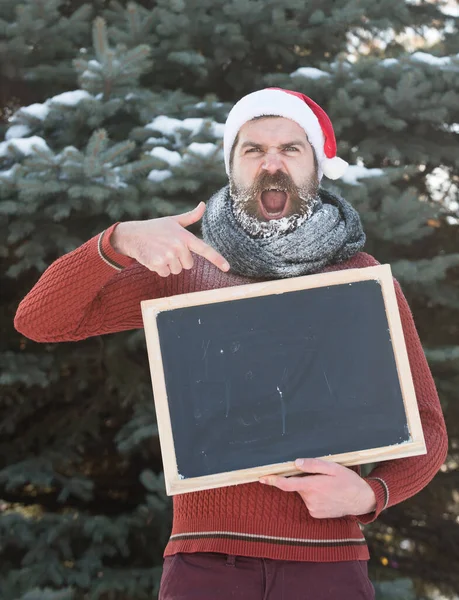 Boş tahtayla Noel Baba diye bağırıyordu. — Stok fotoğraf
