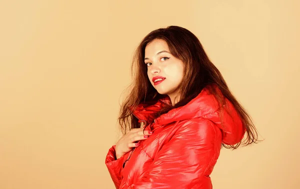 Warm coat. Comfortable down jacket. Red color. Finding right winter jacket is essential to enjoyable winter season. Snow or rain I am ready for both. Girl enjoy wearing bright jacket with hood