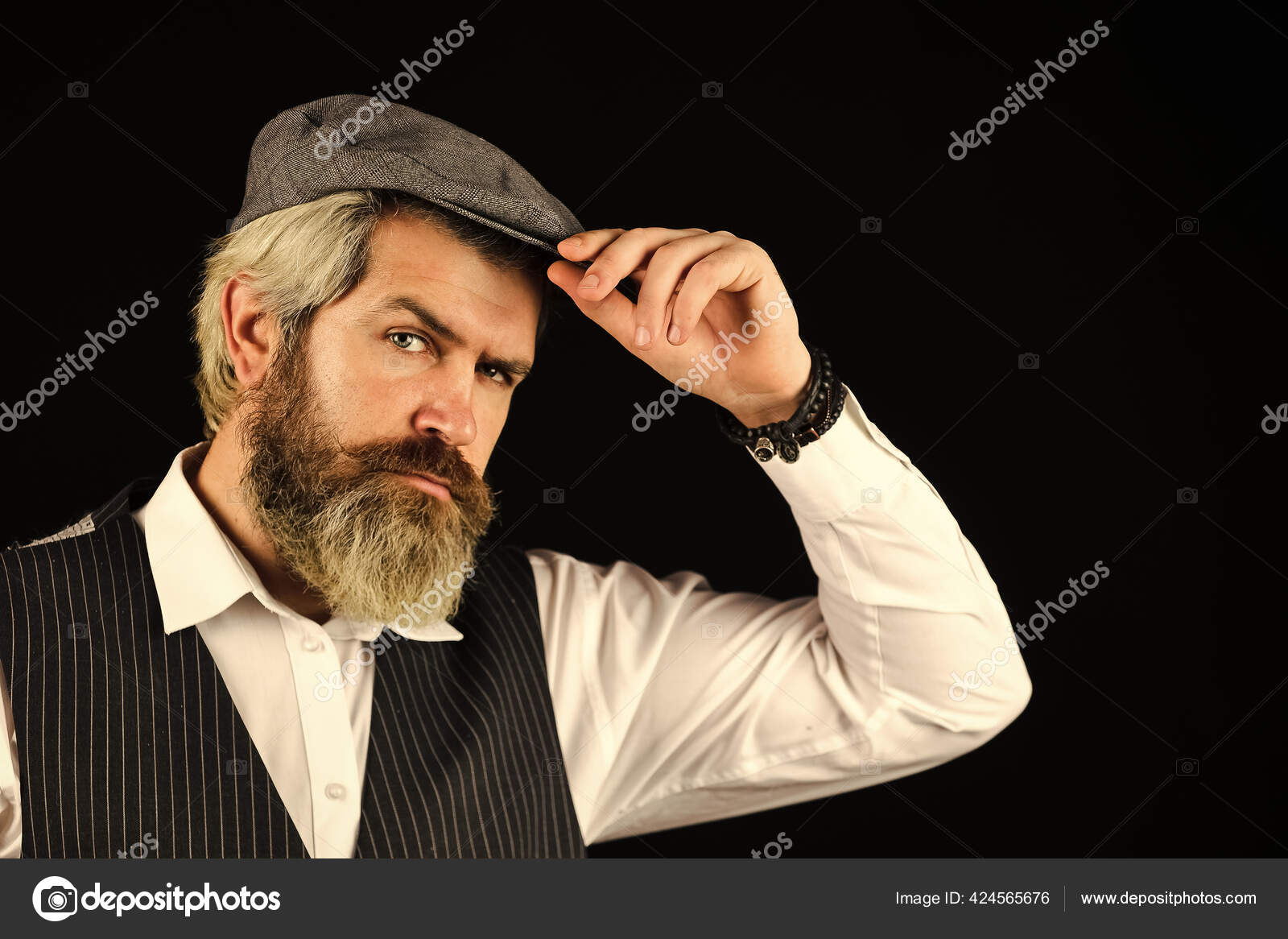 Elegant and stylish hipster. Retro fashion hat. Man with hat. Vintage  fashion. Man well groomed bearded gentleman on dark background. Male  fashion and menswear. Formal suit classic style outfit Stock Photo