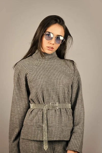 Feel comfortable. Woman wear grey suit blouse and pants. Shop Your Style. Fashionable knitwear. Designed for your comfort. Warm comfortable clothes. Casual style for every day. Knitwear concept