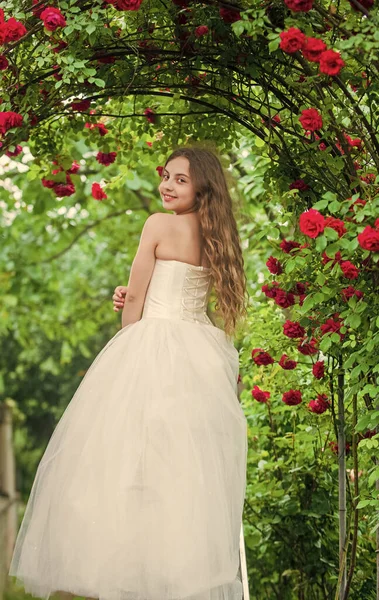 Innocent wedding outlook. girls party dress. female fashion salon. little beauty in blossoming garden. park jasmine flower. beautiful prom queen. look as princess. bridesmaid. childhood happiness