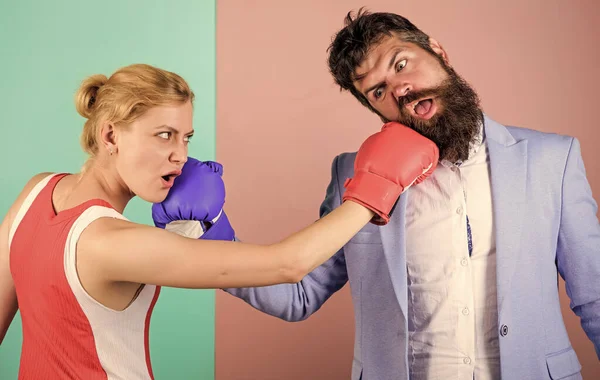 bearded man hipster fighting with woman. Strength and power. knockout punching. who is right. win the fight. family couple boxing gloves. problems in relationship. sport. Boxing sport concept