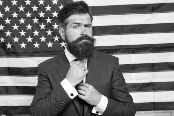 american politician in the election. his election campaign. Bearded businessman being patriotic for usa. American education reform at school in july 4. American citizen hipster at USA flag