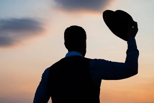 Real freedom. agile business. loneliness. need the inspiration. man feel motivation. businessman in hat silhouette on sky background. confidence and success. concept of successful future — Stock Photo, Image