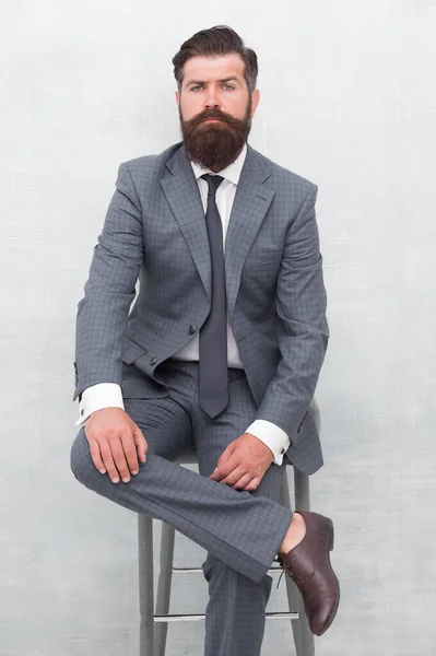 Fairness and justice. Classy and formal. Bearded man wear formal suit. Elegant lawyer sit on chair. Business meeting. Formal event. Man with beard and mustache confident lawyer. Your lawyer — Stock Photo, Image