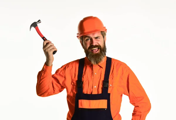 Impulse for changes. Essential tips for using hammer correctly. Requirements for projects. Professional master repair roof. Technical work. Bearded mature man in uniform. Guy with hammer. Good hammer — Stock Photo, Image