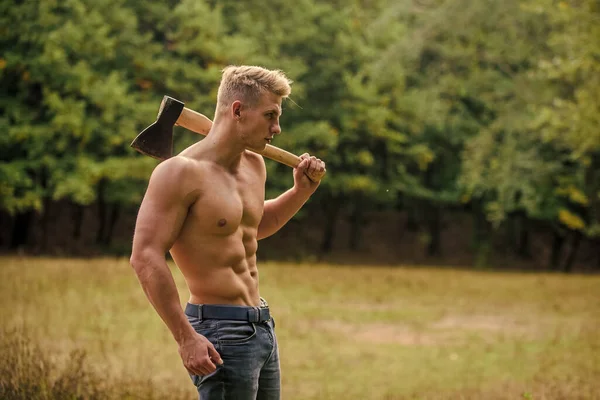 Sexy macho bare torso. Surviving in wild nature. Brutality is sexy. Strength and power concept. Handsome shirtless man muscular body. Muscular athlete in forest. Sport and fitness. Muscular body — Stock Photo, Image