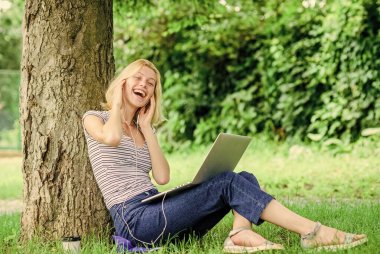 Work in summer park. Reasons why you should take your work outside. Nature is essential to wellbeing and ability to be productive. Girl work with laptop in park. Lunch time relax or coffee break clipart