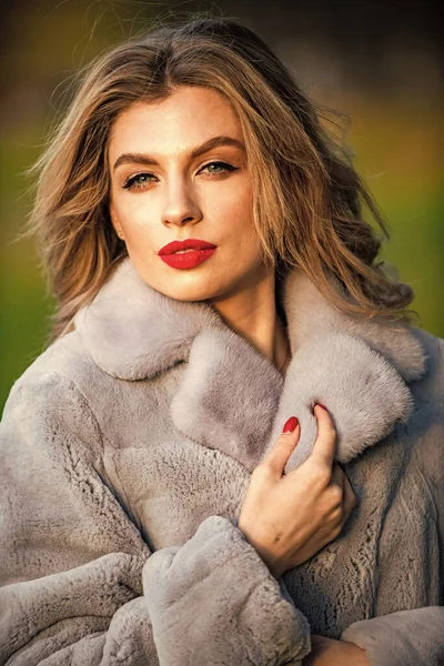 Fur boutique. Soft jacket furry texture. Sexy woman red lips wear fur coat. Businesswoman in fur coat. Simple and warm. Glamorous lady. Cosy autumn outfit. Winter fashion trends. Luxury segment brand