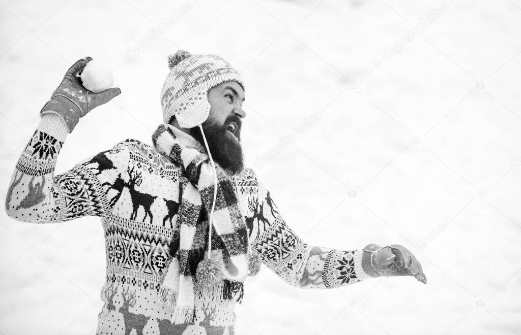 Best holiday. winter season. Christmas snow activity. man having fun outdoor. winter holiday. Morning before xmas. bearded man in warm clothes. Happy new year. happy hipster play snowballs