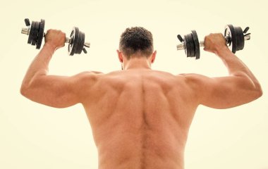 Acı geçicidir, gurur ise sonsuzdur. Kas yığını adam dambıl gibi dikiz aynasıyla egzersiz yapıyor. Sırtı ve kolları güçlü bir sporcu. Spor malzemeleri. Vücut geliştirme sporu. Spor yaşam tarzı. Aptal egzersiz salonu.