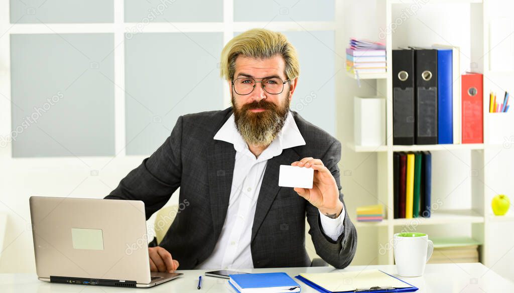 Really good info. Business-minded businessman. bearded man in jacket with laptop. boss in workplace. modern office life. distant work coronavirus quarantine. mature school teacher. my business card