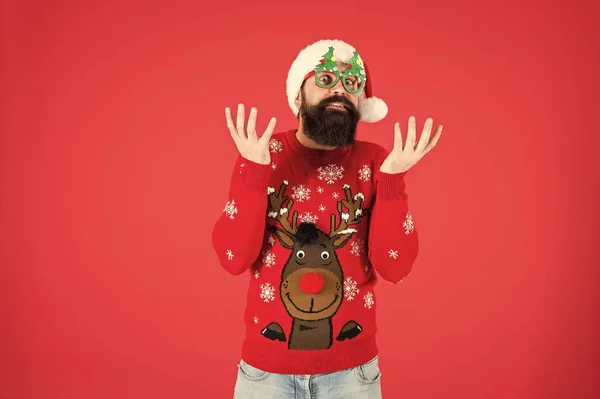 Hipster bearded man wear winter sweater and hat. New year. Knitted sweater. Happy new year. Christmas spirit. Funny outfit. Sweater with deer. Clothes shop. Buy festive clothing. Holidays accessories — Stock Photo, Image