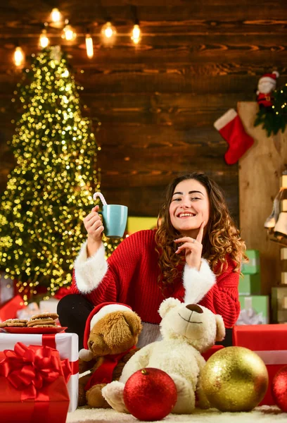 Decorate home. Xmas spirit. Winter sale. Celebrate holiday. Holiday tradition. Santa is near. Happy girl at christmas tree. Family holiday celebration. Happy new year. Woman enjoy cozy atmosphere