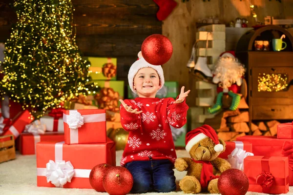 Playful baby boy. Happy child celebrate new year. Little boy play near christmas tree. Christmas eve. Kid fun home. Merry christmas everyone. Cherished dreams. Happy childhood. Winter holidays — Stock Photo, Image