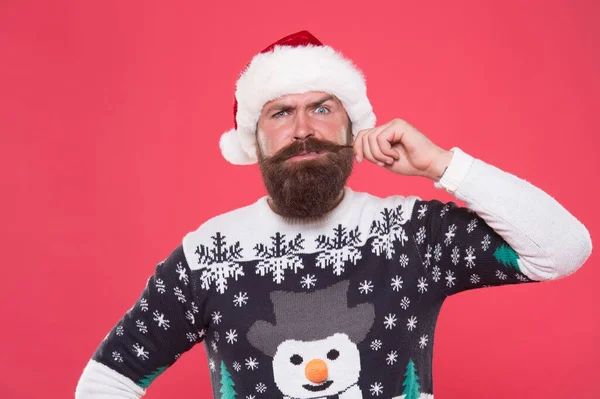 Brutal hipster celebrate xmas party. winter holiday preparations. male winter knitwear fashion. happy new year. merry christmas. serious bearded man in santa hat and sweater. Time to celebrate — Stock Photo, Image