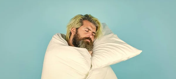Melatonin makes you feel drowsy and helps you stay asleep. Fall asleep on go. Man handsome guy with pillow and duvet. Enough amount sleep. Tips sleeping better. Bearded man sleeping face relaxing — Stock Photo, Image