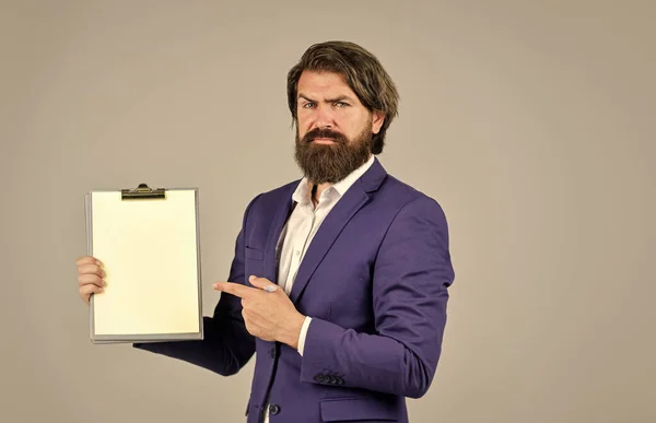 Businessman with folder. Supervising and controlling. Project Curator. Business people concept. Confident businessman holding folder for documents. Control and inspection. Bearded man making notes