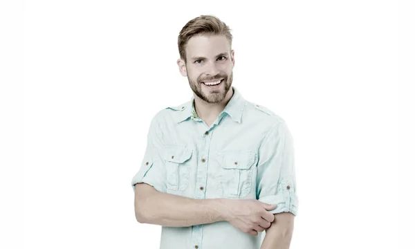 Genuine smile of a cheerful guy. Happy guy isolated on white. Bearded guy smiling in casual summer style. Caucasian handsome guy with sexy smile on bearded face and stylish blond hair — Stock Photo, Image