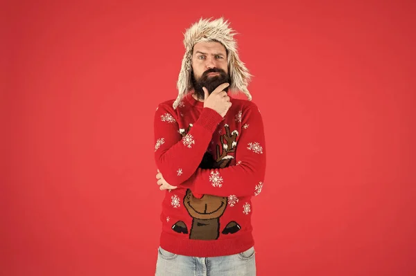 Hard decision. Decision making. Make christmas wish. Life changing decision. Hipster bearded man wear winter sweater and hat. Happy new year. Winter party outfit. Man thoughtful face expression — Stock Photo, Image