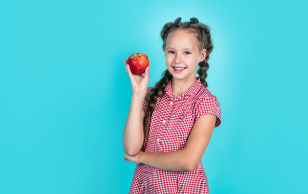 natural and healthy. happy childhood. kid eat apple. child with fruit. teen girl carry apples. autumn harvest. spring season fruits. full of vitamins. organic food only. Hot summer