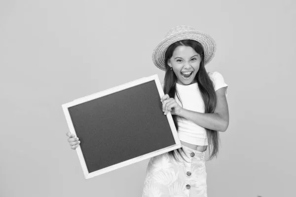 Happy child presenting blackboard. back to school. our school is out for summer. time for traveling. Modern school. your best journey advertisement. summer holiday fun. kid at school. copy space — Stock Photo, Image