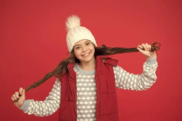 Good vibes. Cheerful child in cosy knitted outfit. Winter fashion. Childhood happiness. Winter activity. Positive concept. Good mood. Emotional wellbeing. Emotions concept. Girl enjoy winter