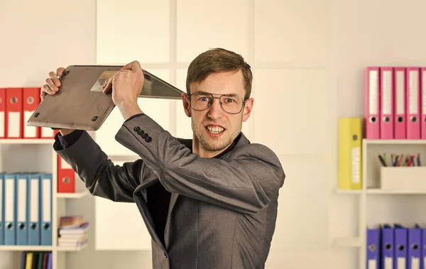 Mad man throwing away laptop online job, hateful job concept — Stock Photo, Image