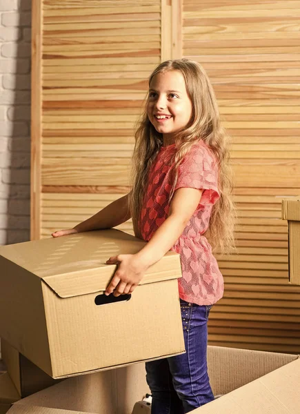 Big storage space. Box package and storage. Small child prepare for relocation. Relocating family stressful for kids. Kid girl relocating boxes background. Relocating concept. Delivery service