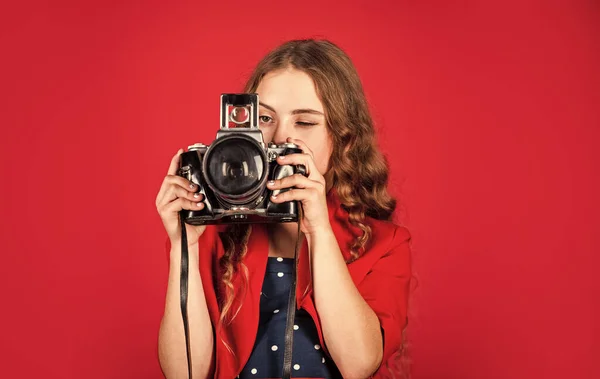 Girl with retro camera. Capture moments. SLR camera. Courses for photographers. Education for reporters and journalists. Learn use presets. Editing photos. Manual settings. Professional camera