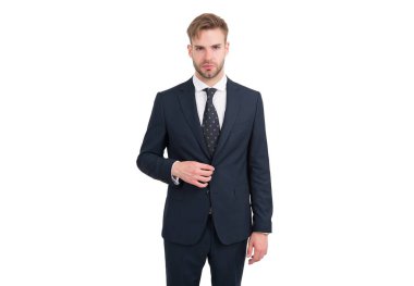 Formalite içinde profesyonel bir patron. Saçları bakımlı, beyaz tenli, başarılı.