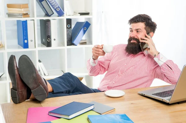 Best way to communicate with your customers. Bearded man talk on cellphone drinking tea. Business communication. 3G. 4G. New technology. Mobile phone communication — Stock Photo, Image