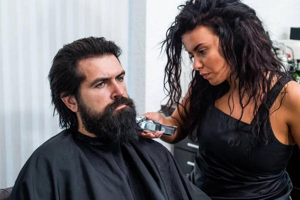 Mature hipster with beard at hairdresser. brutal hipster with moustache make new hairstyle. barbershop. male trendy hairdo. perfect haircut. barber master cut hair with shaver. Make hair stronger — Stock Photo, Image