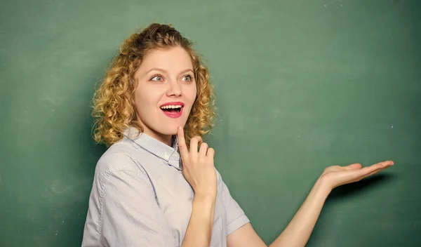 Woman teacher in front of chalkboard. Teacher explain hard topic. Important information to remember. Teacher friend of learners. Better than thousand days diligent study is one day with great teacher — Stock Photo, Image