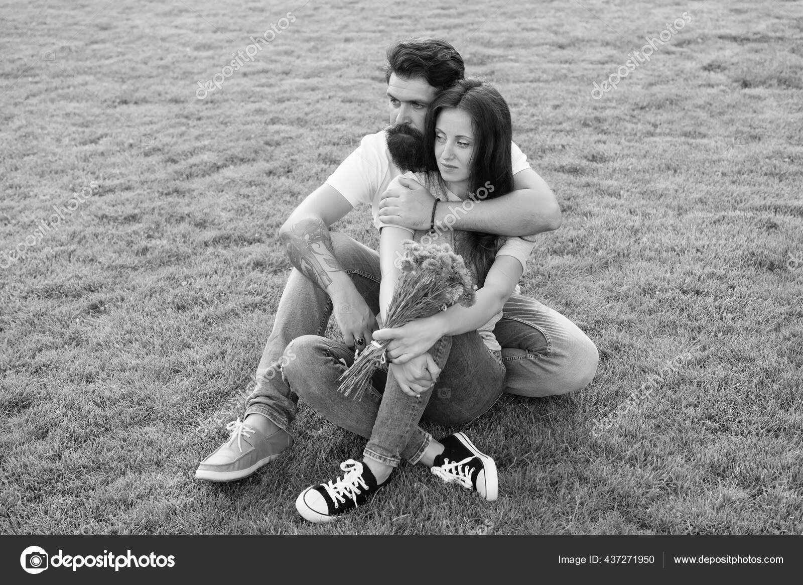 Enjoying intimate moments. Family relax on green grass. Family couple 
