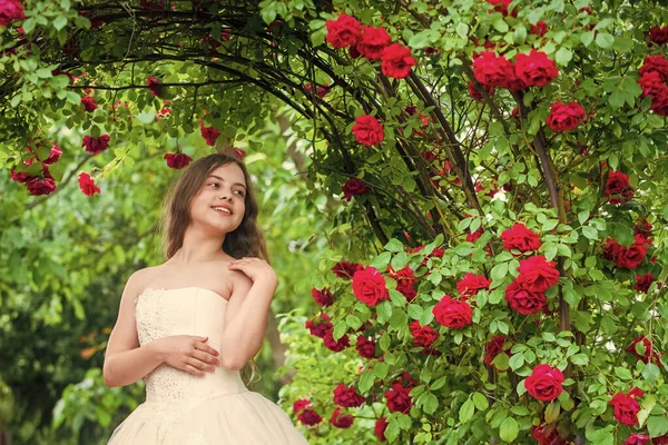 Stunning wedding outlook. childhood happiness. girls party dress. female fashion salon. little beauty in blossoming garden. park jasmine flower. beautiful prom queen. look as princess. bridesmaid — Stock Photo, Image
