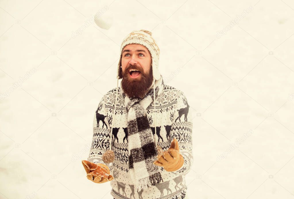 It is so cold. winter holiday. Morning before xmas. winter season. Christmas snow activity. bearded man in warm clothes. Happy new year. man having fun outdoor. happy hipster play snowballs