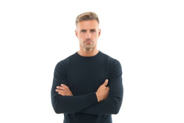 Yakışıklı, traşsız, günlük tarzda bir adam çapraz eller beyaz, kendine güvenen.