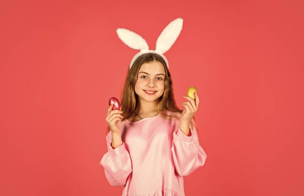 Easter bunny hold painted eggs. happy easter. smiling kid in rabbit ears. Egg hunt on spring holiday. Holiday celebration preparation. Easter is coming. Which one do you want. Easter bunny hunt begin