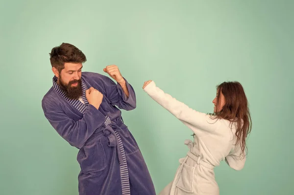 Couple in love bathrobes. Drowsy and weak in morning. Advice relationships surviving quarantine. Morning routine. Couple sleepy faces domestic clothes. All day pajamas. Sleepy people blue background — Stock Photo, Image