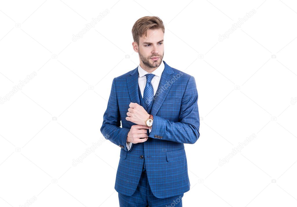 Young realtor fix sleeve button wearing fashion navy suit in business formal style, outfitting.